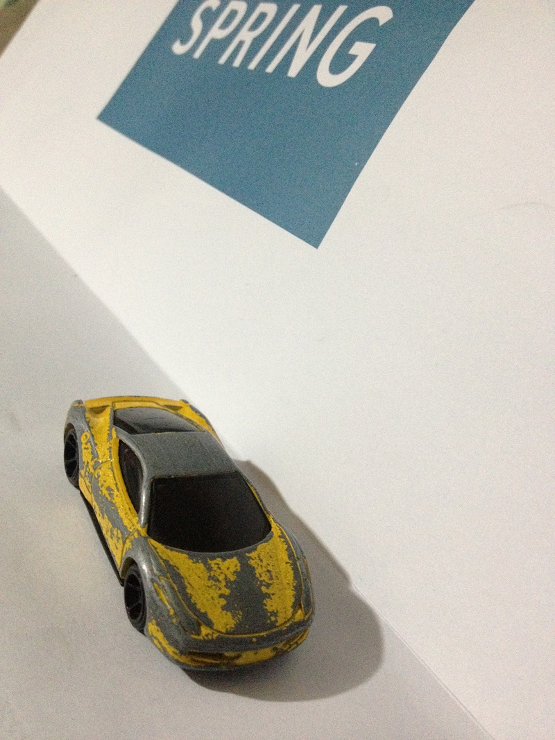 Illustration for article titled Presenting: the most beat-up (but still butt-kicking) 1:64 Ferrari 458 ever